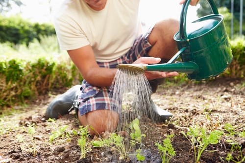 Artificial grass installation in a compact Islington garden